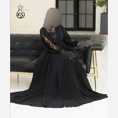 پیراهن زنانه مجلسی کرپ حریر با خرجکار گل برجسته ترک رنگ مشکی سایز 40 تا 50