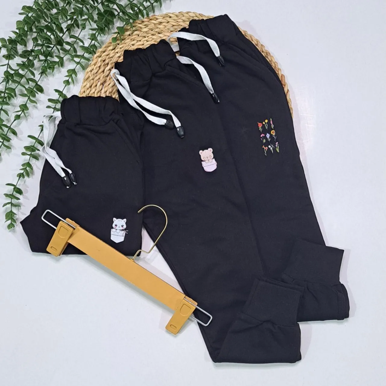 شلوار اسلش دخترانه دورس دونخ طرح دار مشکی سایز 60 تا 75