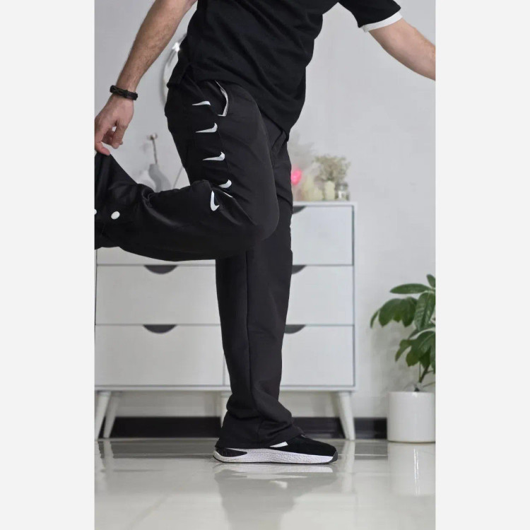 شلوار اسلش بگ دمپا دکمه پارچه فلامنت مشکی فری سایز